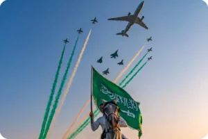 Saudi flags and air show during National Day celebrations
