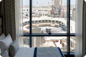 Makkah hotel room overlooking Masjid al-Haram for Umrah pilgrims