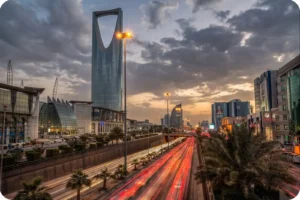 Riyadh skyline with Kingdom Centre beneath a clear blue sky